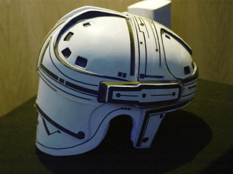 Note the 4 vent holes along the rear area on each side. The medium- and large-sized have 5 holes so I think this is a small Cooper SK-2000 hockey helmet.