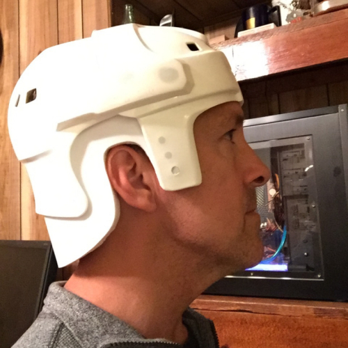 Neck visor complete, using rigid vinyl backing and craft foam padding.  Looks authentic compared to original prop helmets, yet is more durable in the long run.