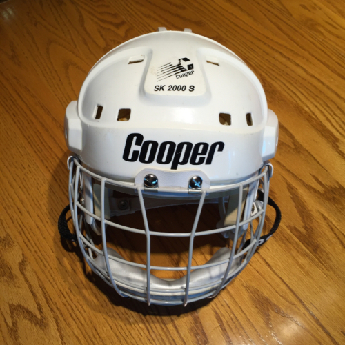 Cooper SK 2000 S (small) hockey helmet.  This helmet is a magnificent specimen (Homestar!) complete with face guard and side guards.